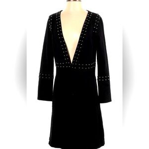 Vocal black blazer with stud detail.
